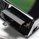 Illustration for article titled The New Xbox 360 in Person: So Glossy It Hurts